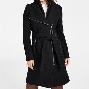 Calvin Klein black belted black coat
Wore once, Size M